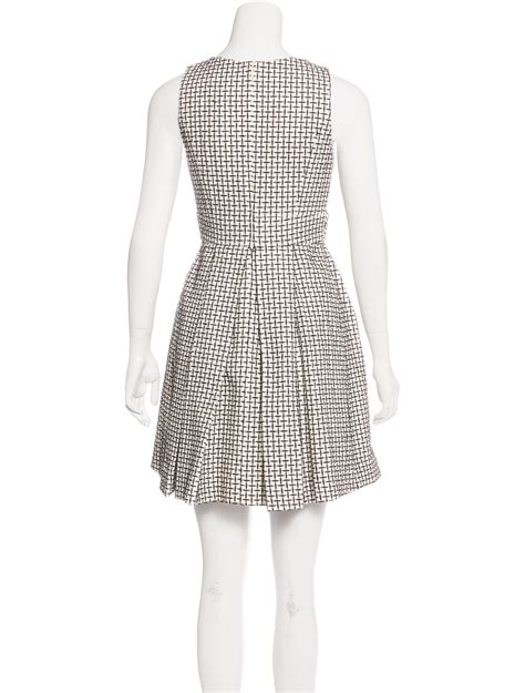 chanel style tweed dress|Chanel pleated dress.